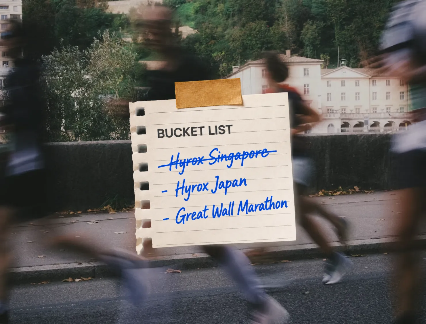 A bucket list note taped over a photo of runners mid-race