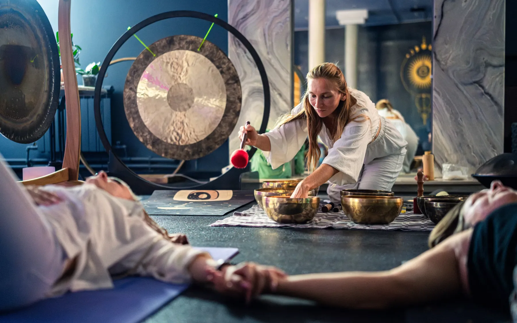 A sound-bath session with singing bowls and gongs